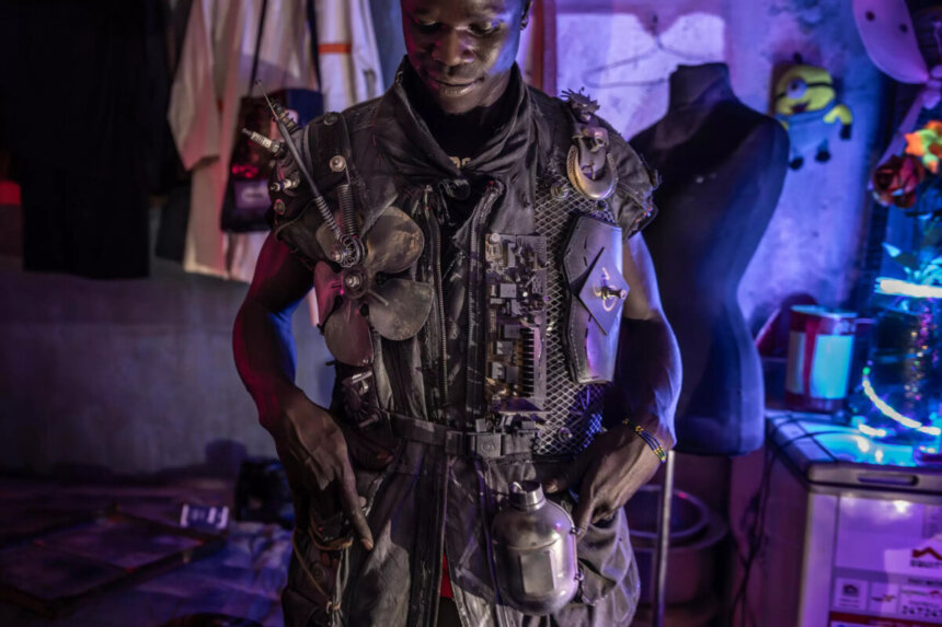 Fashion designer Pius Ochieng wears one of his dystopian inspired pieces © LUIS TATO / AFP